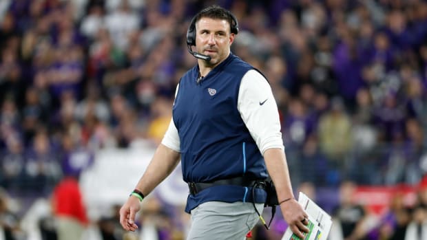 Tennessee Titans head coach Mike Vrabel stands on the field against the Baltimore Ravens in a AFC Divisional Round playoff football game at M&T Bank Stadium.